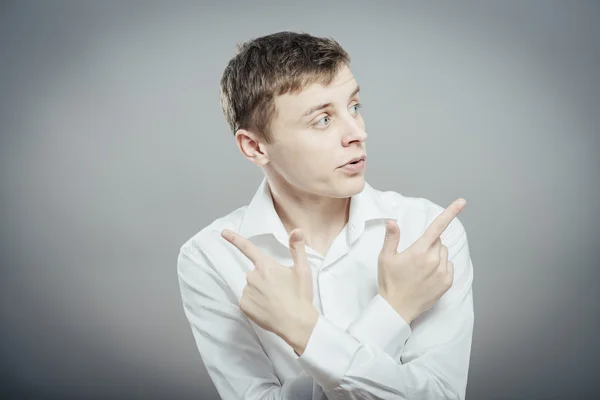Man showing different directions — Stock Photo, Image