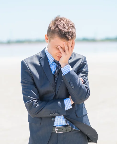 Frustrated young businessman — Stock Photo, Image
