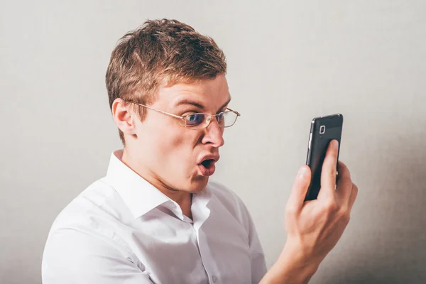 Man  shouts into the phone — Stock Photo, Image