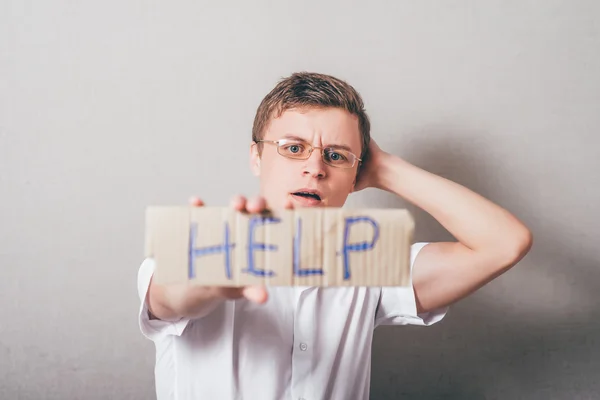 Hombre sosteniendo ayuda palabra — Foto de Stock