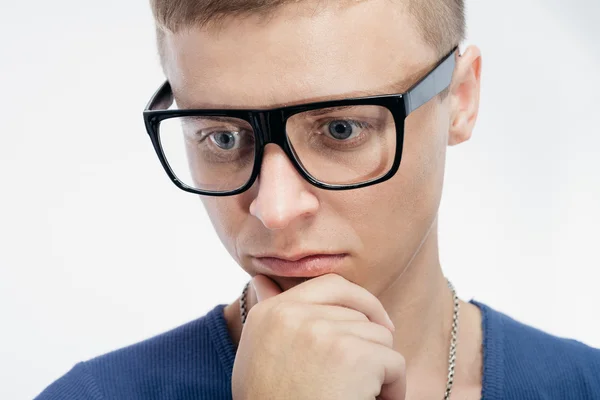 Man in glasses thinking — Stock Photo, Image