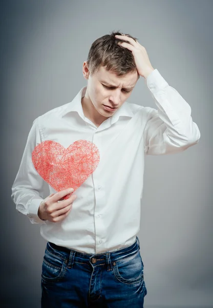 Man holding red heart — Stock Photo, Image