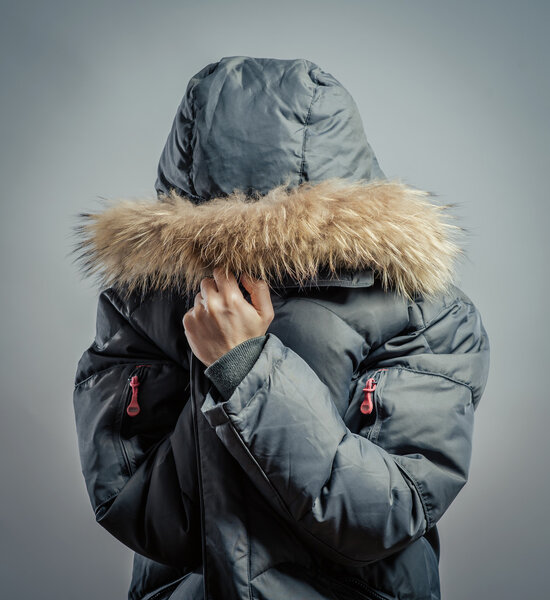 Young man feeling cold