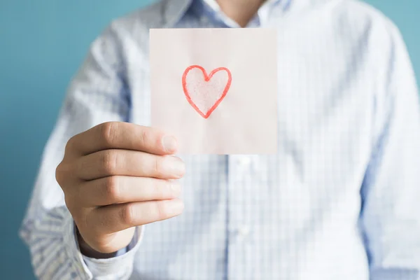 Icono del corazón sobre papel — Foto de Stock