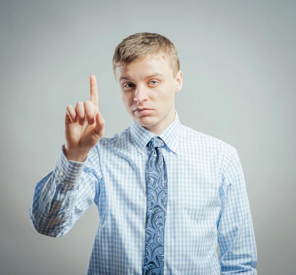 Homem fazendo gesto indicador — Fotografia de Stock