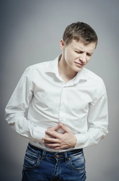 Muž trpící bolest žaludku — Stock fotografie