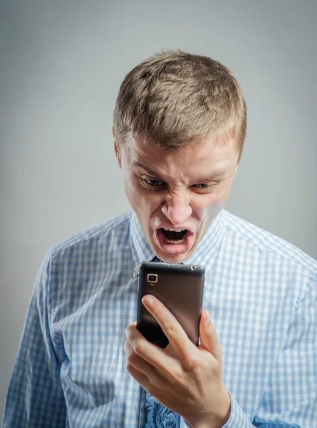 Exited man with mobile phone — Stock Photo, Image