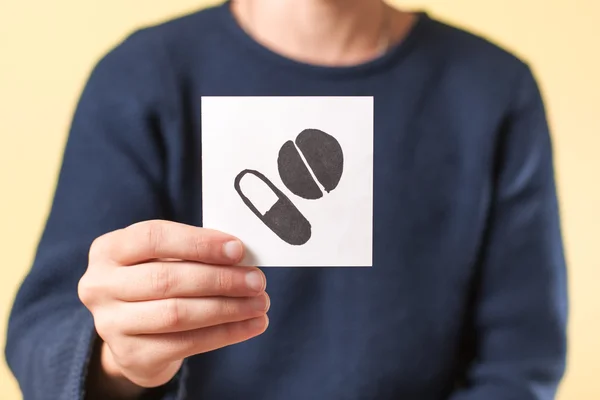 Assorted pills drawing in hand — Stock Photo, Image