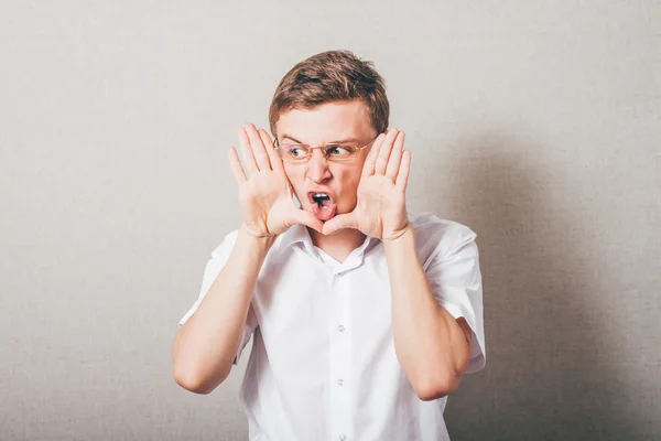 Man in glasses shouts — Stock Photo, Image