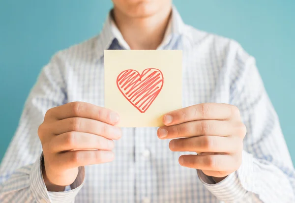 Icono del corazón sobre papel —  Fotos de Stock