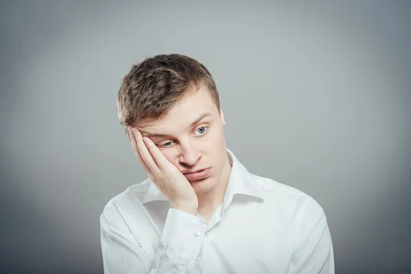 Young man with a headache — Stock Photo, Image