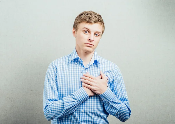 Man holding hands on heart — Stock Photo, Image