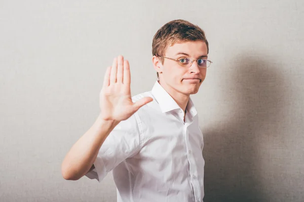 Hombre mostrando gesto stop — Foto de Stock