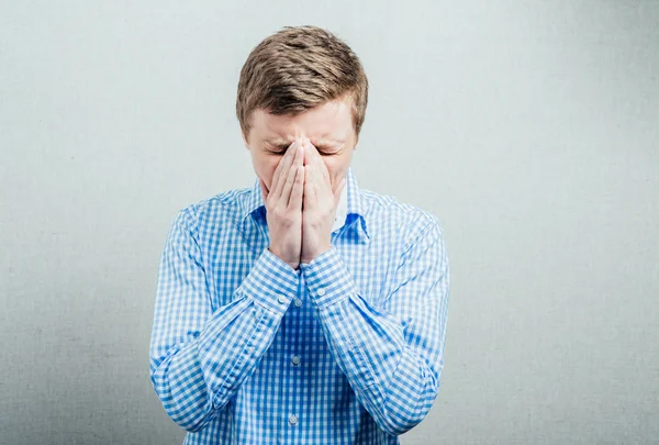 Man closes mouth with his hands — Stock Photo, Image