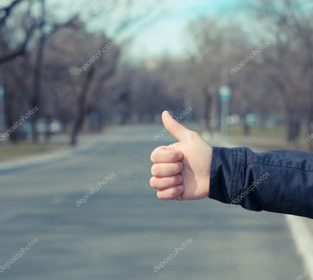 Hitchhiker sign thumb up Stock Photo by ©file404 114086672