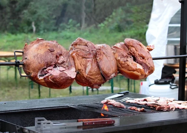 Roasted pork meat  on the spit — Stock Photo, Image