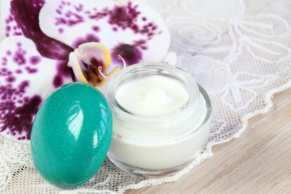 Face and body cream with orchid — Stock Photo, Image