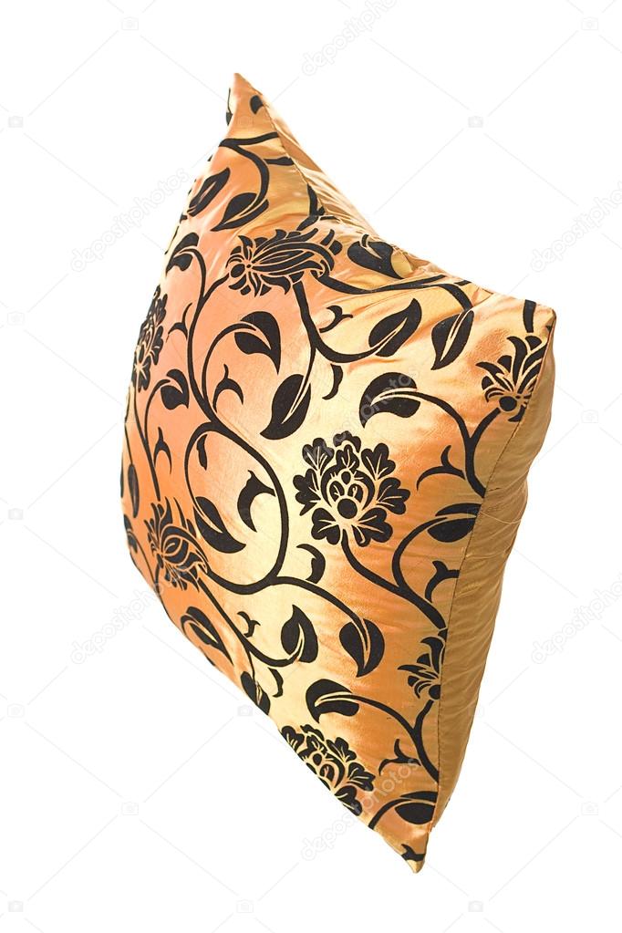 Golden silk pillow with black ornaments