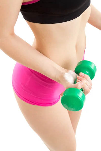 Fitness girl with green dumbbells — Stock Photo, Image