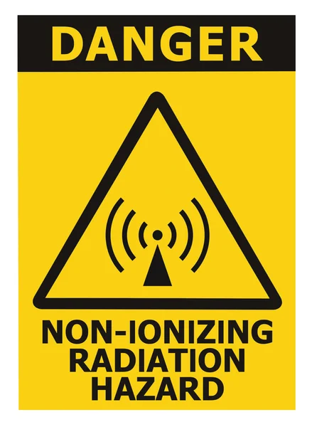 Área de segurança de risco de radiação não ionizante, aviso de perigo etiqueta de etiqueta de sinal de texto, grande sinalização de ícone, triângulo preto isolado sobre amarelo, macro close-up — Fotografia de Stock