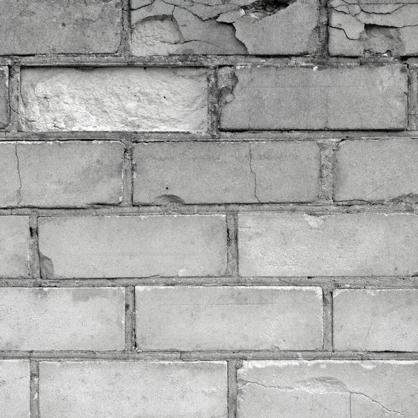 White light grey old aged weathered fine brick wall texture, grungy damaged calcium silicate bricks pattern detail background macro closeup, large detailed textured vertical grunge ruined brickwork