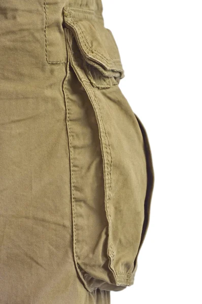 Military olive green army style cotton twill cargo pants storage pocket isolated macro closeup, large detailed camouflage trousers studio shot — Stock Photo, Image