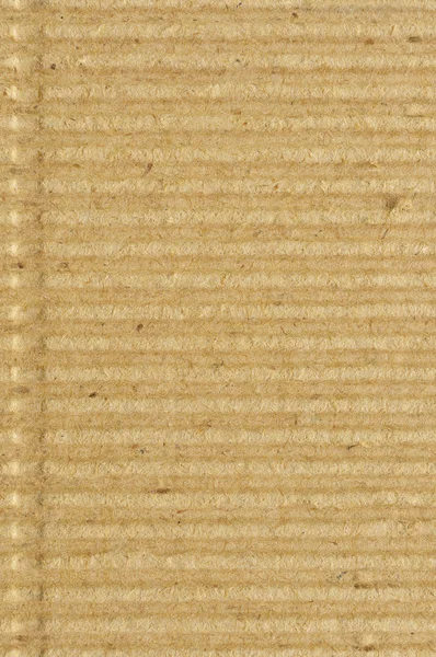 Corrugated cardboard goffer paper texture rough old recycled goffered textured blank empty grunge copy space background aged grungy macro closeup taupe brown tan yellow beige detail vintage pattern — Stock Photo, Image