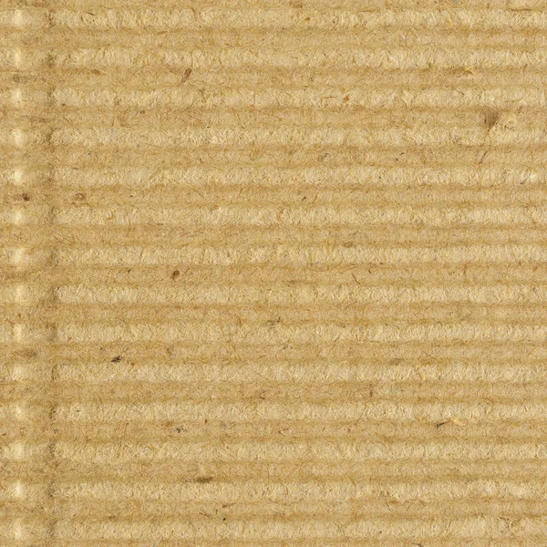 Gegolfd karton goffer papier textuur, lichte ruwe oude gerecycleerd goffered getextureerde lege lege grunge kopie ruimte achtergrond grote leeftijd grungy macro close-up verticale taupe bruin tan gele beige — Stockfoto