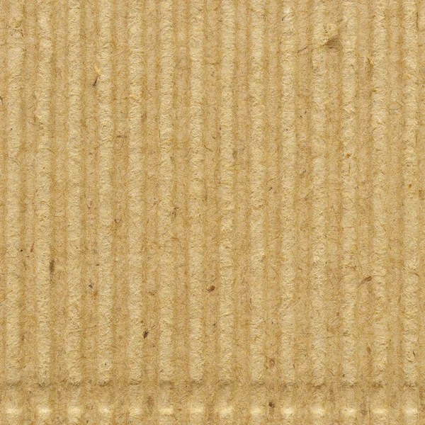 Corrugated cardboard goffer paper texture rough old recycled goffered textured blank empty grunge copy space background aged grungy macro closeup taupe brown tan yellow beige detail vintage pattern — Stock Photo, Image