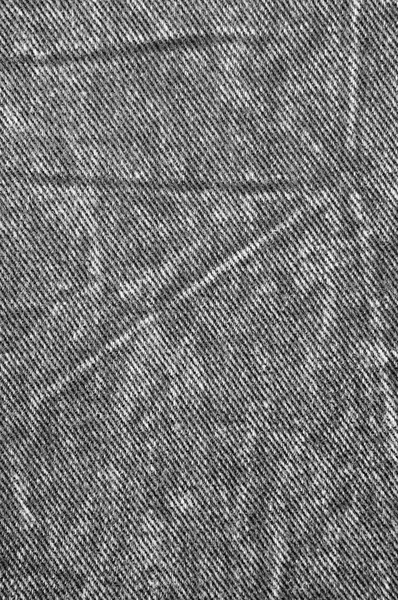 Naturale Lino Nero Denim Cotone Chinos Jeans Texture, Dettagliato Macro Primo Piano, indossato rustico stropicciato vintage strutturato casuale pietra lavaggio tessuto tela twill diagonale sfondo, bianco, grigio, spazio copia verticale — Foto Stock