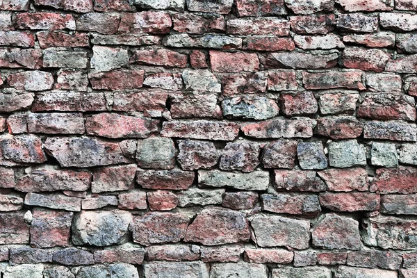 Sten wall närbild, horisontella stonewall bakgrund, gammal åldern väderbiten röd grå grunge kalksten dolomit kalciumkarbonat hårt sedimentära skiffer platta rock textur, naturliga grungy texturerat tegelstenar, beige, gul, röd, grå tegel vintage — Stockfoto