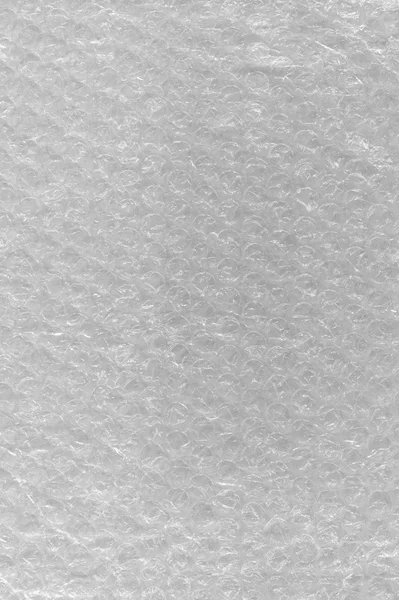 Struttura dell'involucro della bolla Sfondo astratto, Dettagliato strutturato verticale macro primo piano, Luminoso modello bianco trasparente bolle d'aria di plastica bubblewrap imballaggio materiale dell'involucro — Foto Stock