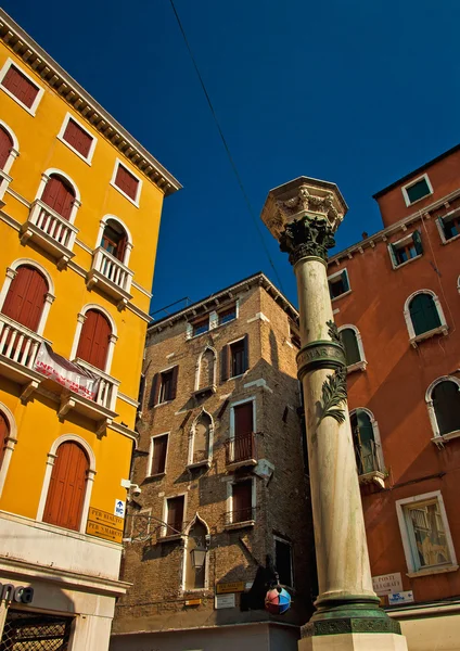 Venetian street with colorful houses — Stock Photo, Image