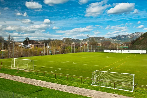 Football field at mountain — Stock Photo, Image