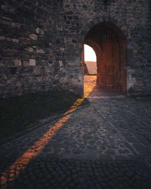 Sunset Light Through the Ancient Gate of Visegrd Castle, Hungary
