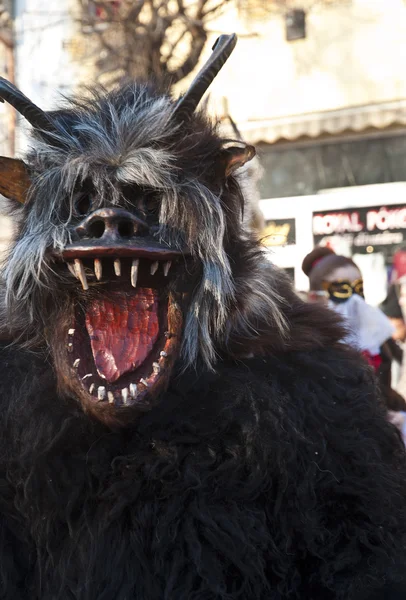 Unidentified people in mask at the Mohacsi Busojaras carnival Stock Photo