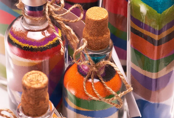 Flessen met kleurrijke zand — Stockfoto