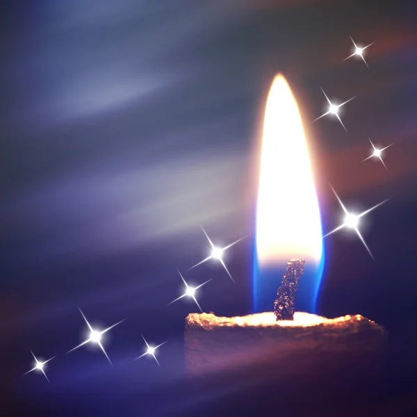 燃烧的蜡烛上抽象色彩背景 — 图库照片