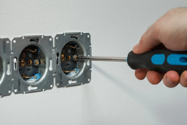 Installing wall socket — Stock Photo, Image