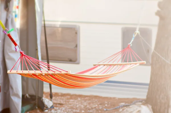 Camping swing bed hanging between two tree — Stock Photo, Image