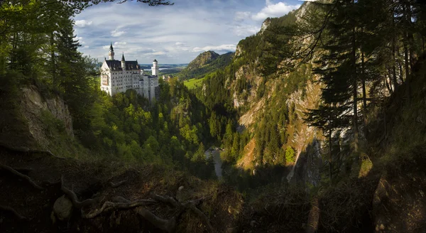 Το κάστρο Neuschwanstein στο φως το βράδυ — Φωτογραφία Αρχείου