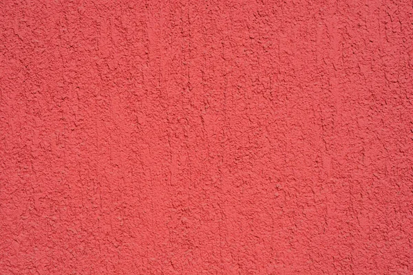 Kırmızı boyalı kaba bir duvarın ayrıntıları