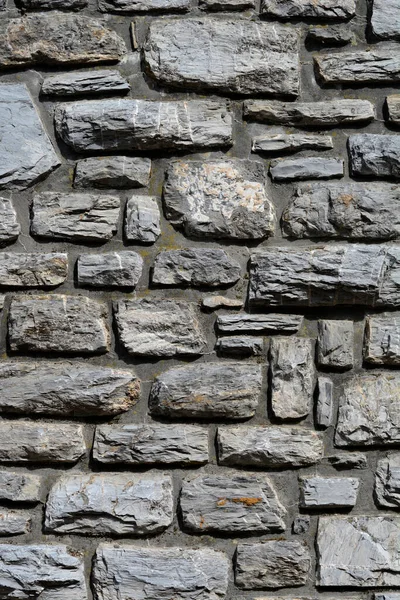 Detail Van Een Grijze Ruwe Stenen Muur — Stockfoto