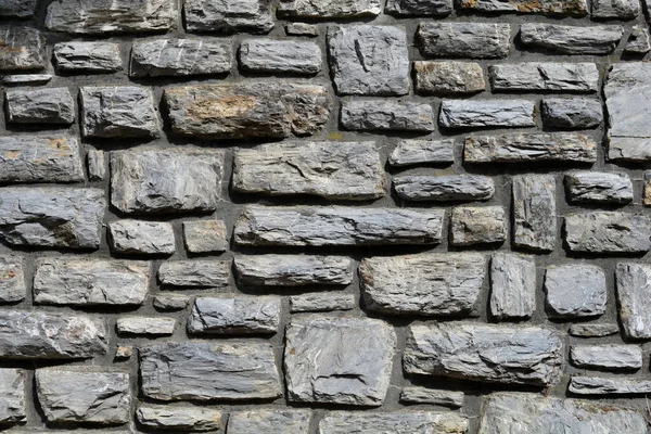 Detail Van Een Grijze Ruwe Stenen Muur — Stockfoto