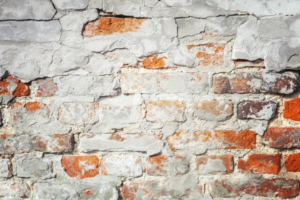 Damaged brick wall — Stock Photo, Image