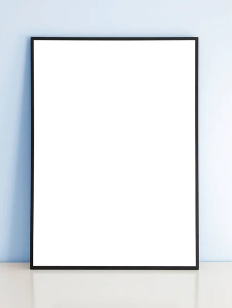 Thin Black Mock Frame Table Blue Wall Stock Image