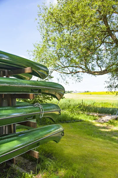 Green canoes — Stock Photo, Image