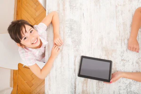 Mother and Daughter with a Tablet PC — Stock Photo, Image