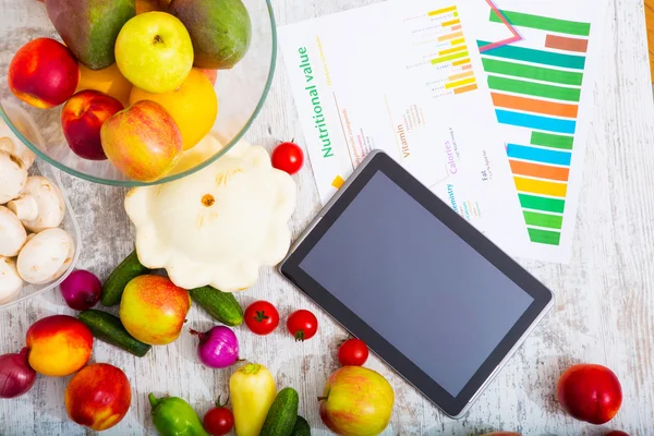 Nutrizione sana e tablet — Foto Stock
