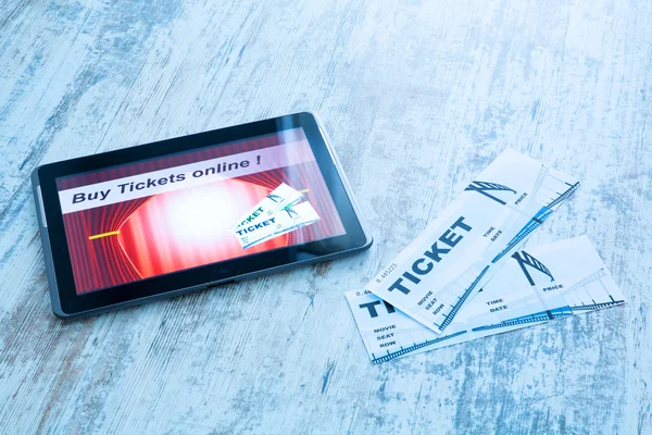 Buy Cinema Tickets online with a Tablet PC — Stock Photo, Image